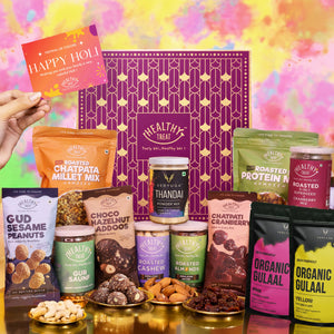 Magic Holi Gift Hamper | Roasted Dry Fruits, Healthy Snacks, Hazelnut Laddoo, Thandai Mix, Herbal Gulal & Holi Greeting Card