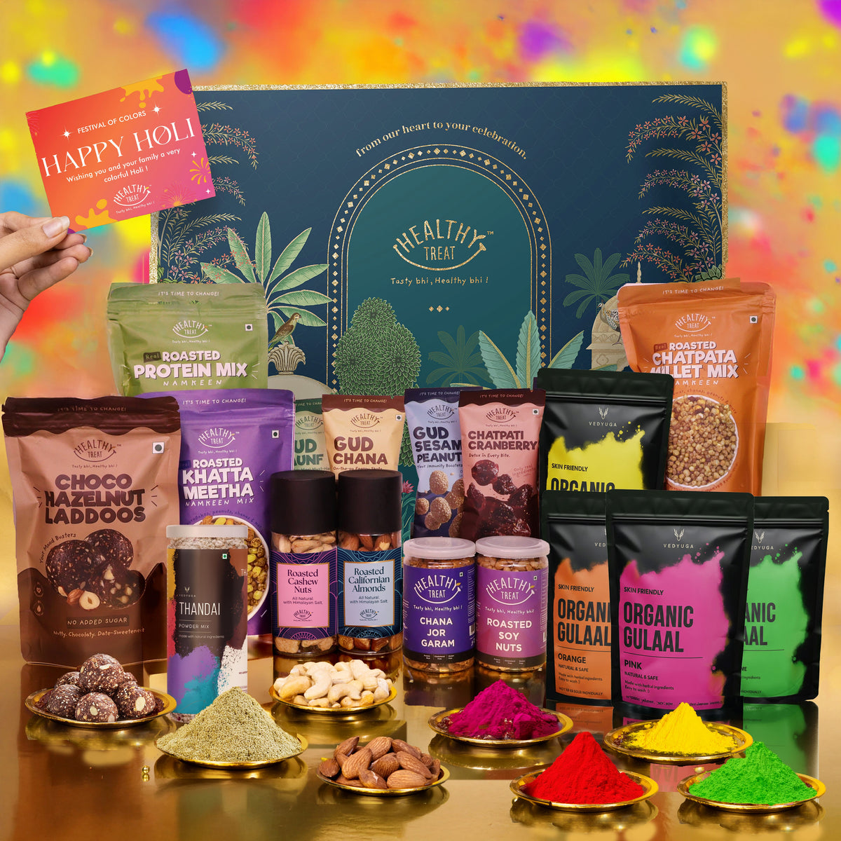 Festive Luxe Holi Gift Hamper | Roasted Dry Fruits, Healthy Snacks, Hazelnut Laddoo, Thandai Mix, Herbal Gulal & Holi Greeting Card