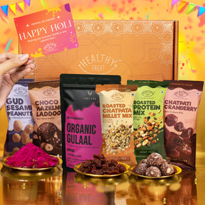 Wholesome Treats Holi Gift Hamper | Roasted Healthy Snacks, Thandai Mix, Hazelnut Laddoo, Herbal Gulal & Holi Greeting Card