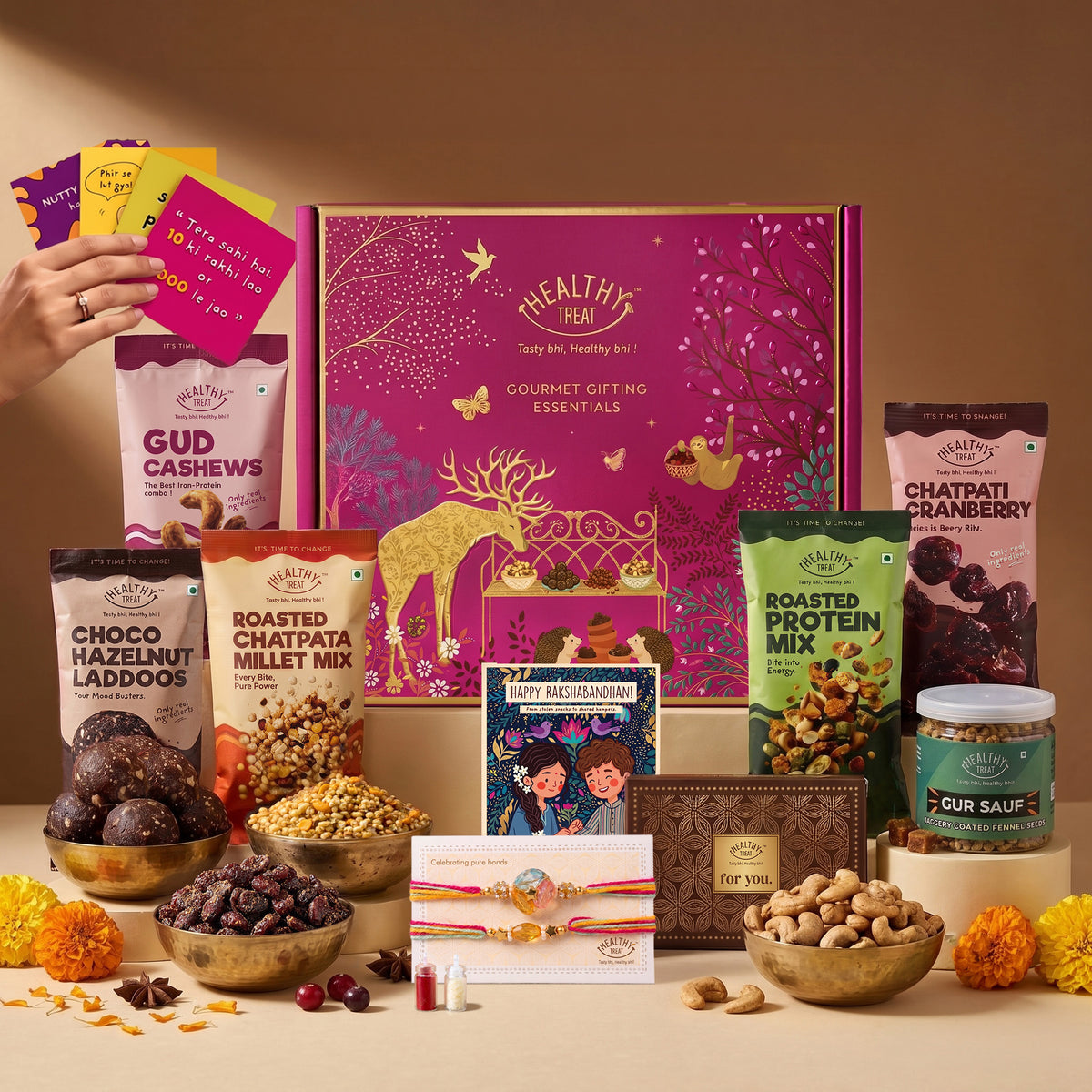 Anmol Rakhi Gift Hamper for Brother with Snacks, 14 Items | 2 Handcrafted Rakhis, Roli Chawal, Greeting Card, Protein Mix, Gud Cashew, Choco Laddoo, Millet Mix, Raksha Bandhan Combo