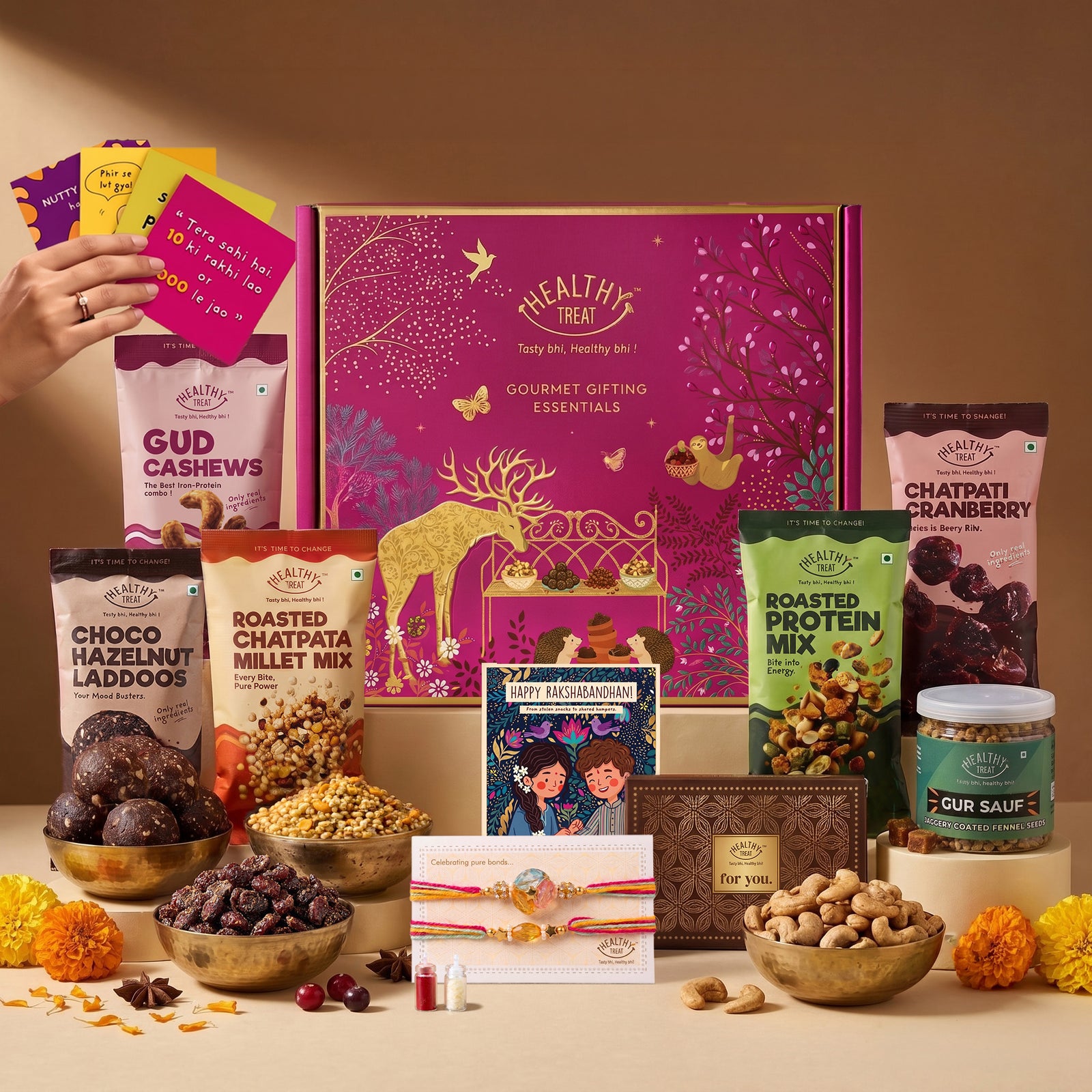 Anmol Rakhi Gift Hamper for Brother with Snacks, 14 Items | 2 Handcrafted Rakhis, Roli Chawal, Greeting Card, Protein Mix, Gud Cashew, Choco Laddoo, Millet Mix, Raksha Bandhan Combo