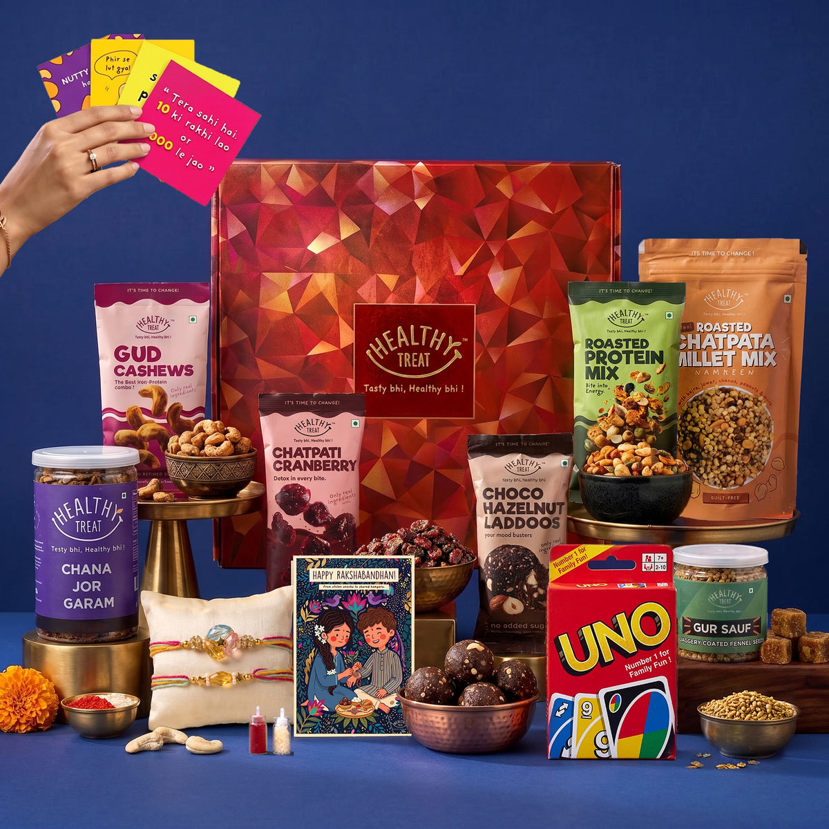 Bachpan Ki Yaadein Premium Rakhi Hamper for Brother, 16 Items | Rakhi Pair, Roli Chawal, Dry Fruits, Gud Cashew, Chana Jor, Choco Laddoo, Gud Saunf, Cranberry,