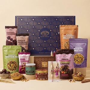Perfect Jodi Bhaiya Bhabhi Rakhi Hamper with Lumba, 11 Items | Lumba Rakhi Pair, Roli Chawal, Scented Candle, Choco Laddoos, Gud Cashew, Khatta Meetha, Gud Saunf, Raksha Bandhan Jodi